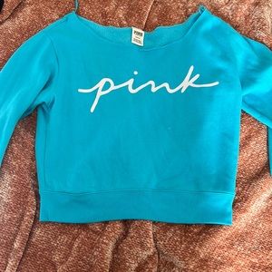 blue low neck pink sweater